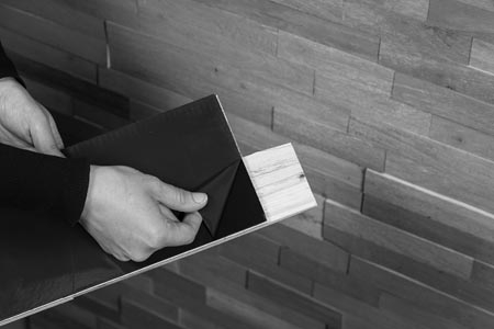 The adhesive on the back side of the Aspect tiles is engineered to be aggressive and pressure-sensitive