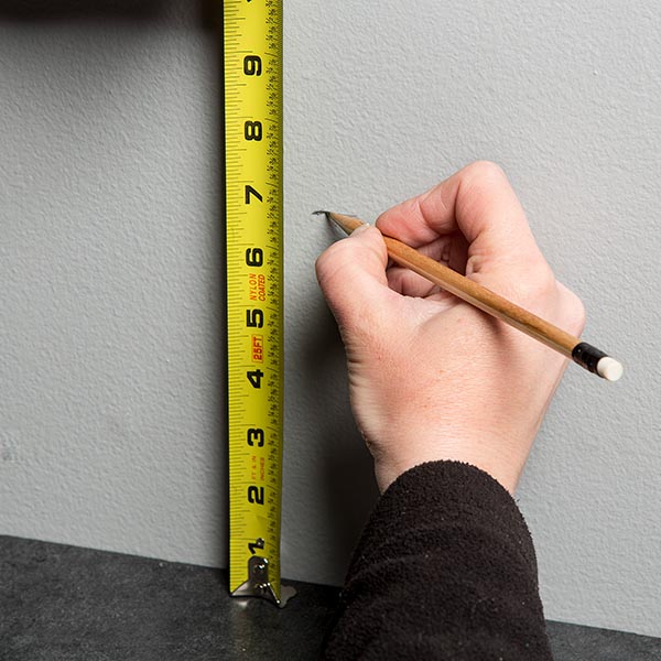 Measure up 6-1/2" from low point and use as scribe reference line