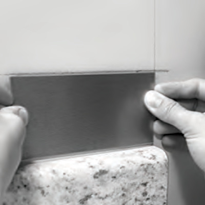 The adhesive on the back of Aspect Metal tiles is extra sticky and pressure sensitive