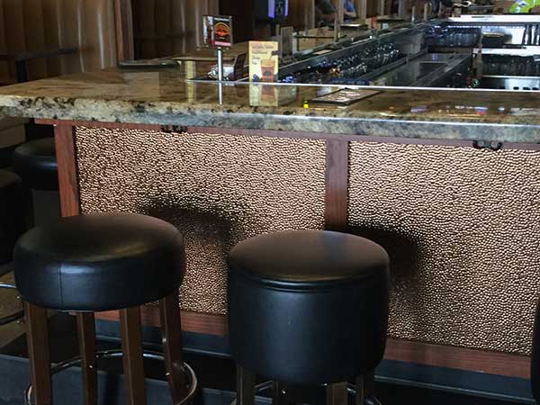 Milwaukee Burger - Fasade Hammered Wall Panel in Oil-Rubbed Bronze