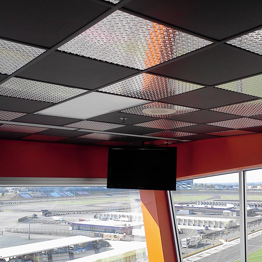 Charlotte Motor Speedway - Genesis Smooth-Pro Ceiling Panels in Black and Fasade's Diamond Plate in Brushed Aluminum